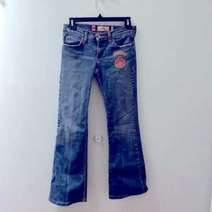 Juicy couture peace sign flare jeans